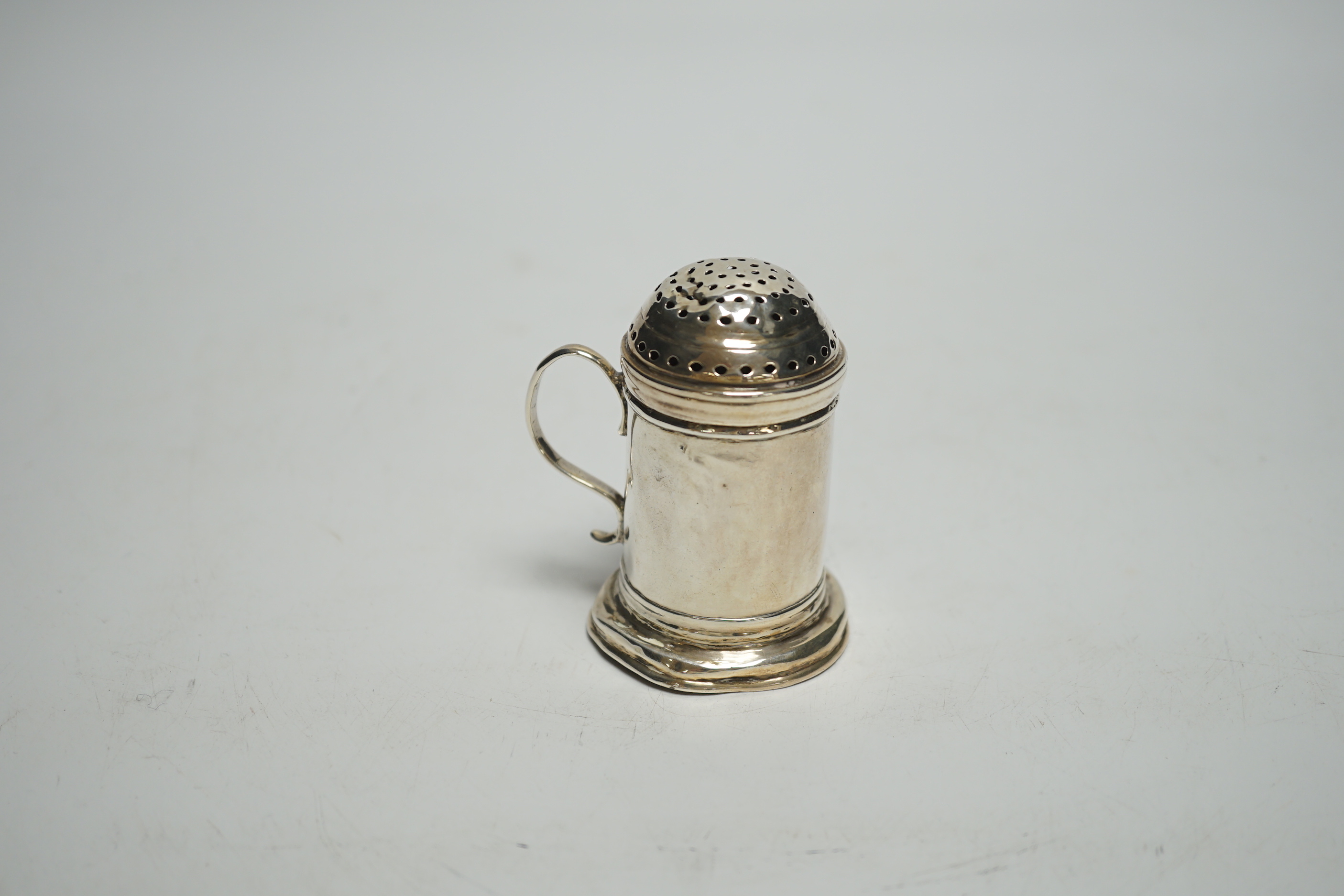 A George I Britannia standard silver kitchen pepper, William Fleming, London, 1718, 67mm, 56 grams.